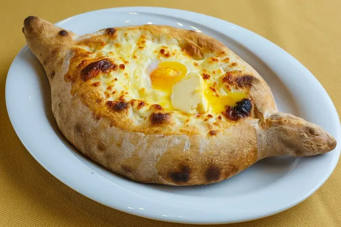 Khachapuri Adjaruli with egg and butter 2016